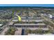 Aerial view showing building location and surrounding area at 4001 58Th N St # 20, Kenneth City, FL 33709
