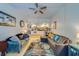 Spacious living room and kitchen area, enhanced with natural light and comfortable seating at 4001 58Th N St # 20, Kenneth City, FL 33709