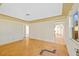 Living room with parquet flooring and a view of the kitchen at 4426 4Th N Ave, St Petersburg, FL 33713