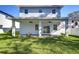Newly built home with covered patio and fenced-in backyard at 515 Elm St, Safety Harbor, FL 34695