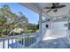 Balcony with white railing and view of neighborhood at 515 Elm St, Safety Harbor, FL 34695