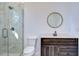 Clean bathroom, featuring marble shower and vanity at 515 Elm St, Safety Harbor, FL 34695