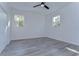 Well-lit bedroom, featuring grey wood-look floors at 515 Elm St, Safety Harbor, FL 34695
