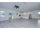 Open living room with hardwood floors, high ceilings and lots of natural light at 515 Elm St, Safety Harbor, FL 34695
