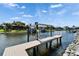 A dock stretches into the canal, offering boat access at 721 Manns Harbor Dr, Apollo Beach, FL 33572