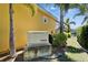 Image shows a Generac generator installed alongside the home's exterior, ensuring reliable backup power in case of emergencies at 721 Manns Harbor Dr, Apollo Beach, FL 33572