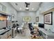 Spacious home office with two workstations and built-in shelving at 721 Manns Harbor Dr, Apollo Beach, FL 33572
