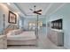 Serene main bedroom with a comfortable bed and plenty of natural light at 721 Manns Harbor Dr, Apollo Beach, FL 33572