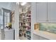 Well-organized pantry with ample shelving for storage at 721 Manns Harbor Dr, Apollo Beach, FL 33572