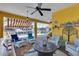 Relaxing patio with seating area, grill, and pool access at 721 Manns Harbor Dr, Apollo Beach, FL 33572
