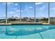 Water feature detail of sparkling pool at 721 Manns Harbor Dr, Apollo Beach, FL 33572