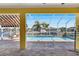 A refreshing pool with a screened enclosure and water view at 721 Manns Harbor Dr, Apollo Beach, FL 33572