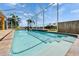 A screened-in pool with clear blue water, and views of the canal at 721 Manns Harbor Dr, Apollo Beach, FL 33572