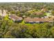 Aerial view of community, showcasing homes and lush landscaping at 7577 Mediterranean Ct, Hudson, FL 34667