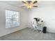 Bright bedroom with desk and window at 8849 Little Bluestem Dr, Land O Lakes, FL 34637