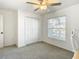 Simple bedroom with closet and window at 8849 Little Bluestem Dr, Land O Lakes, FL 34637