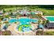 Resort-style pool with a water park and clubhouse at 8849 Little Bluestem Dr, Land O Lakes, FL 34637