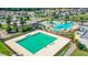 Community lap pool and leisure pool with water features at 8849 Little Bluestem Dr, Land O Lakes, FL 34637