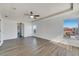 Bright bedroom with wood-look floors and ceiling fan at 11217 Avery Oaks Dr, Tampa, FL 33625