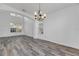 Bright dining room with hardwood floors and a chandelier at 11217 Avery Oaks Dr, Tampa, FL 33625