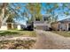 Two-story house with a large front yard and attached garage at 11217 Avery Oaks Dr, Tampa, FL 33625