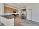 Modern kitchen with stainless steel appliances and wood cabinets at 11217 Avery Oaks Dr, Tampa, FL 33625