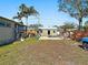 Large backyard with patio, shed, and ample space for outdoor activities at 133 80Th N Ave, St Petersburg, FL 33702