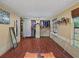 Bedroom with hardwood floors and a built-in closet at 133 80Th N Ave, St Petersburg, FL 33702