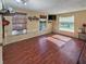 Living room with hardwood floors and ample natural light at 133 80Th N Ave, St Petersburg, FL 33702