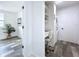 Bright laundry room with washer, dryer, and built-in desk at 2310 W Ivy St, Tampa, FL 33607
