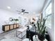 Living room showcasing a grey sectional sofa and modern decor at 2310 W Ivy St, Tampa, FL 33607