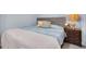 Cozy bedroom with a double bed and nightstand at 5021 69Th N Way, St Petersburg, FL 33709