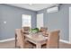 Dining area with a light beige table and four chairs at 5021 69Th N Way, St Petersburg, FL 33709