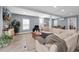 Open concept living room with sectional sofa and TV at 5021 69Th N Way, St Petersburg, FL 33709