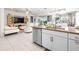 Modern kitchen with granite countertops and stainless steel appliances at 5124 Highland Pointe Ct, Wimauma, FL 33598