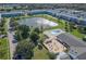 Community overview featuring a pool, lake, and residential buildings at 6000 20Th N St # 114, St Petersburg, FL 33714