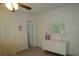 Bedroom with ensuite bathroom access and a dresser at 6000 20Th N St # 114, St Petersburg, FL 33714