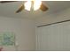 Bedroom with a double closet and ceiling fan at 6000 20Th N St # 114, St Petersburg, FL 33714