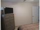 Bright bedroom with double bed, dresser, and large closet at 6000 20Th N St # 114, St Petersburg, FL 33714
