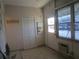 Bright condo entryway with closet and access to outside at 6000 20Th N St # 114, St Petersburg, FL 33714