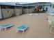 Community area with cornhole and other lawn games at 6000 20Th N St # 114, St Petersburg, FL 33714
