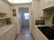 Bright kitchen features white cabinets, ample counter space, and modern appliances at 6000 20Th N St # 114, St Petersburg, FL 33714