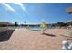 Relaxing pool area with plenty of lounge chairs and a patio at 6000 20Th N St # 114, St Petersburg, FL 33714