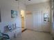 Sunroom with coastal decor and access to bathroom and closet at 6000 20Th N St # 114, St Petersburg, FL 33714