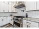 Modern kitchen with stainless steel appliances and granite countertops at 6010 Kipps Colony E Dr, Gulfport, FL 33707