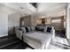 Spacious open-concept living area with a large sectional sofa, high ceilings, and modern finishes throughout the home at 6010 Kipps Colony E Dr, Gulfport, FL 33707