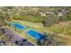 Aerial view of two well-maintained tennis courts at 6010 Kipps Colony E Dr, Gulfport, FL 33707