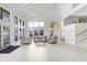 Spacious clubhouse with high ceilings, ample natural light, and comfortable furniture at 8609 Mallard Reserve Dr # 202, Tampa, FL 33614