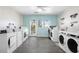 Laundry room with multiple washers and dryers at 8609 Mallard Reserve Dr # 202, Tampa, FL 33614