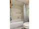 Clean bathroom featuring a bathtub, toilet and shower at 1221 Drew St # E11, Clearwater, FL 33755